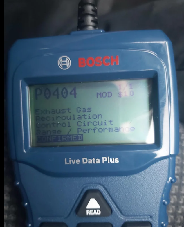 Bosch OBD-II scan tool displaying a stored P0404 code.