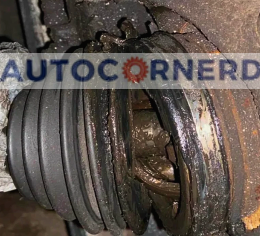 CV joint with its rubber boot pulled back, exposing the joint area.