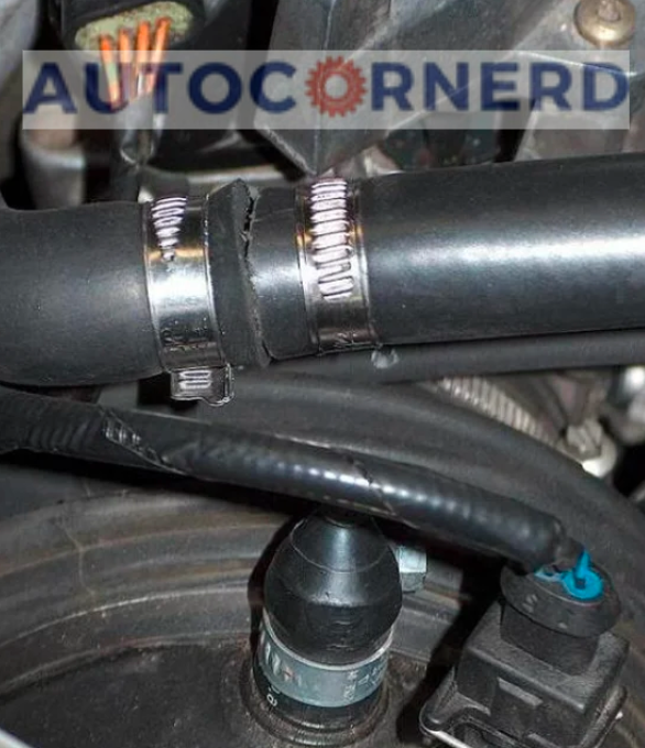 PCV hose connection with a split section near a clamp.