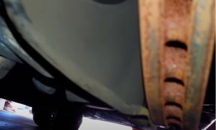 dust shield of brake is bent and collides with the brake disc