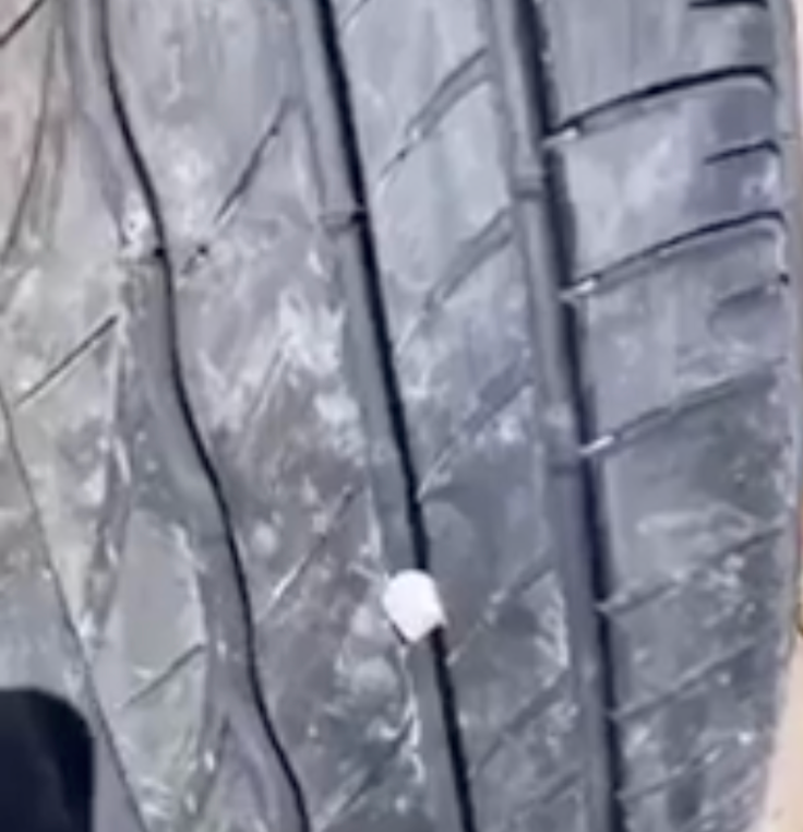 stone stuck in tire