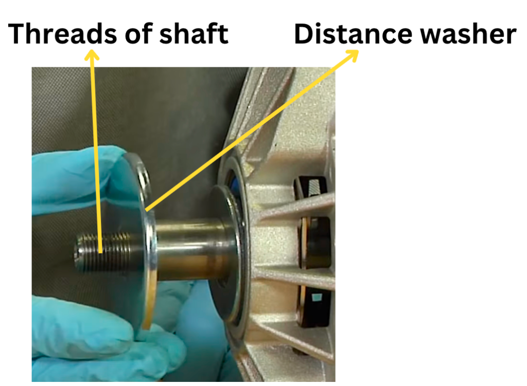 distance washer of alternator pulley shaft