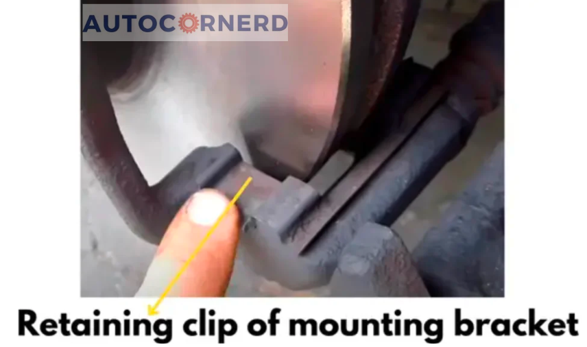 retaining clips of caliper bracket need to be lubricated