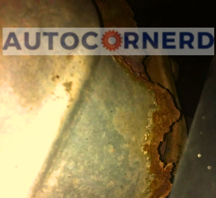 Damaged or Loose Heat Shield Around The Exhaust