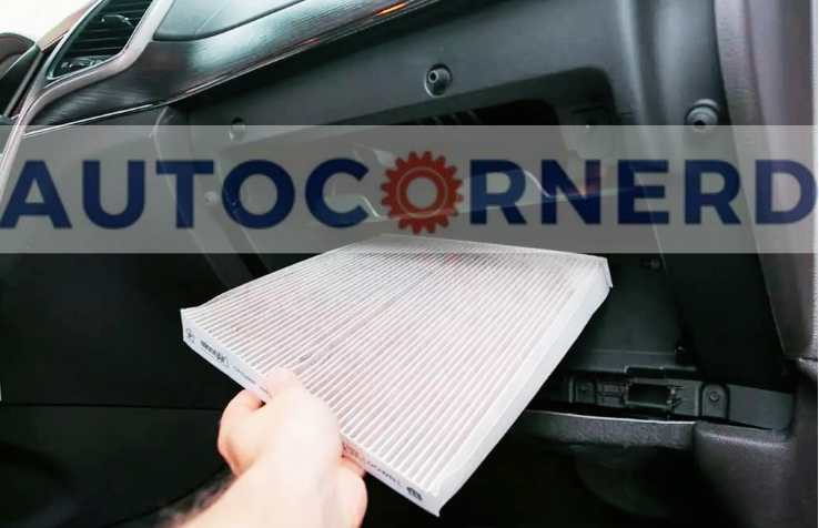 Replacing a dirty cabin air filter to address and eliminate the sour, vinegar-like odor often experienced when the car's air conditioning is in use.