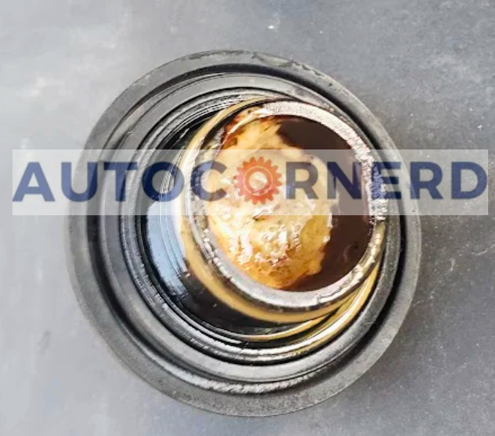 milky foam on radiator cap due to oil and coolant mixing